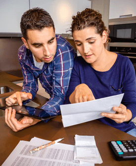 couple calculating finances 